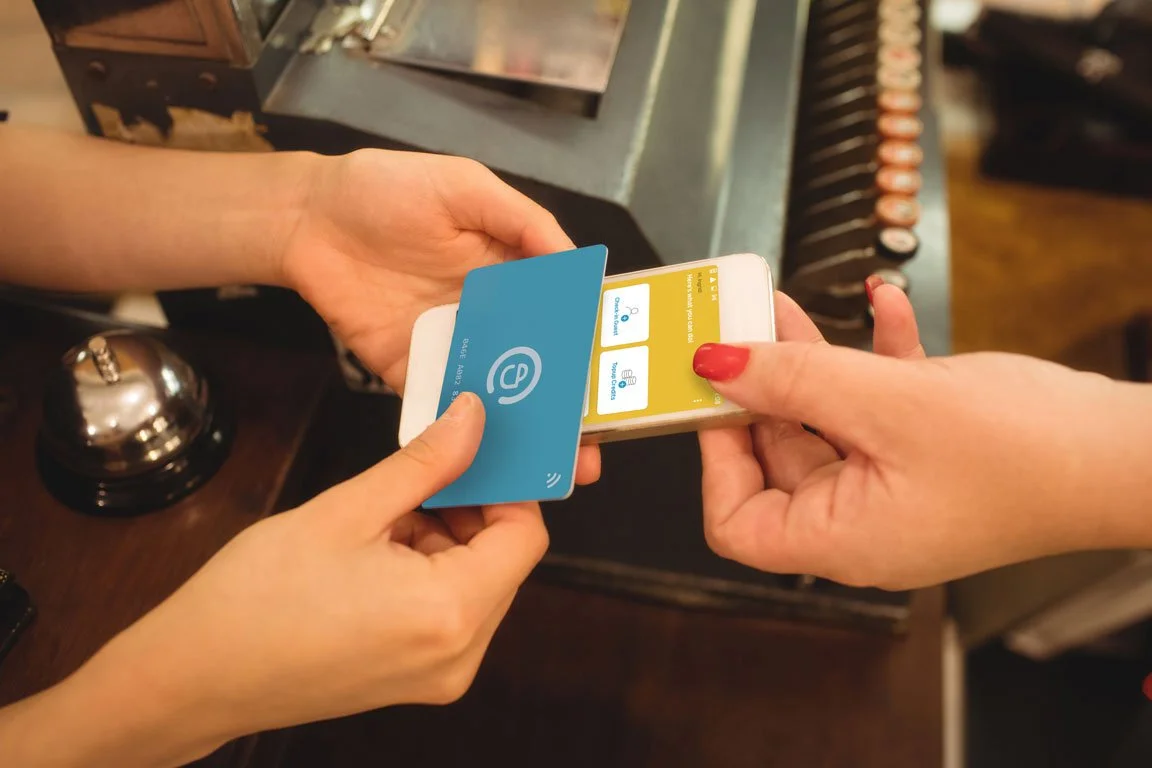 Pouchnation card tapping the POS reader