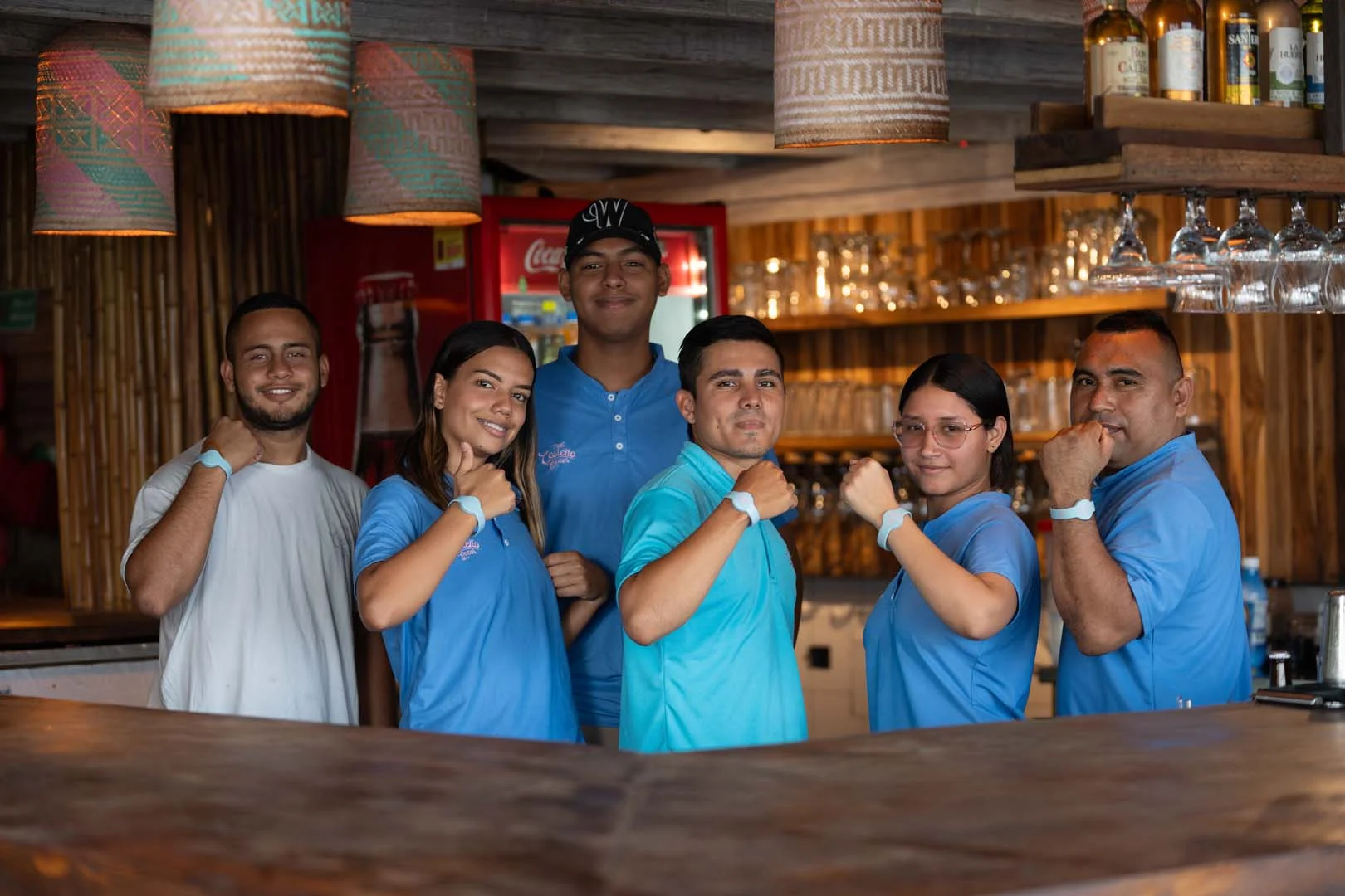 Hostel staff showing Social Creative wristbands
